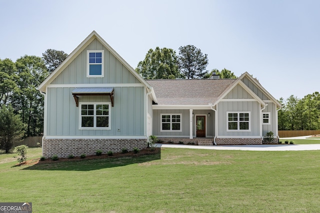 170 New High Shoals Rd, Watkinsville, GA 30677 - view of front facade featuring board and batten siding, a front yard, and roof with shingles