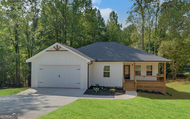 single story home featuring driveway, a front yard, a garage, a shingled roof, and a porch