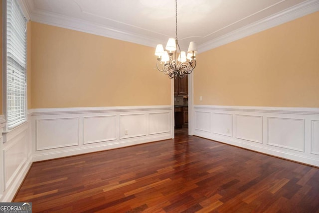 unfurnished living room featuring a tiled fireplace, a tray ceiling, carpet floors, ceiling fan, and ornamental molding