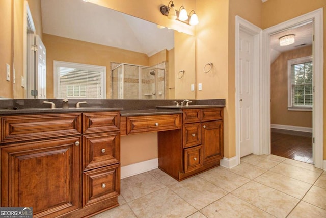 full bathroom featuring vanity, toilet, tile patterned floors, and washtub / shower combination