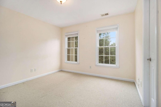 empty room featuring carpet floors