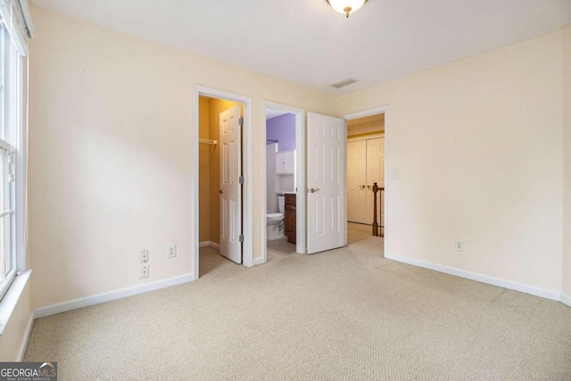 unfurnished bedroom featuring a closet