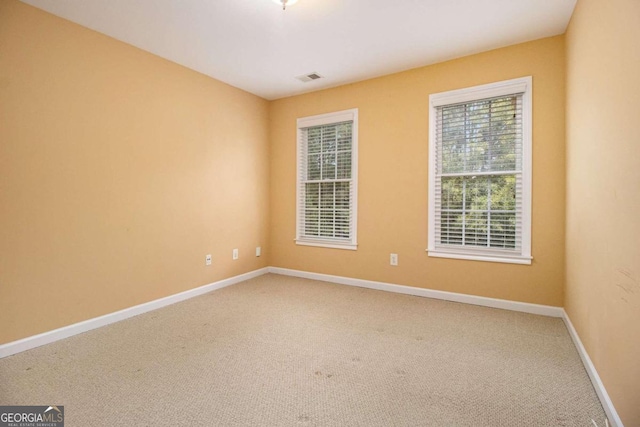 view of carpeted spare room