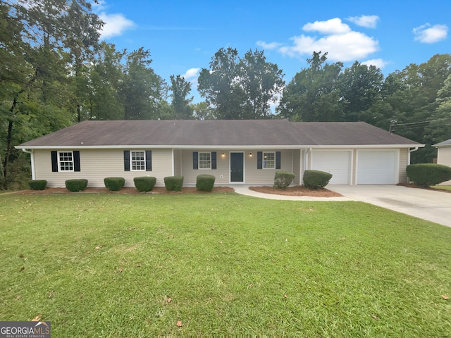 single story home with a front lawn and a garage