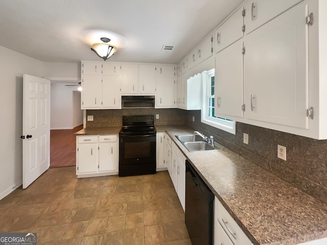 kitchen featuring black appliances, sink, ventilation hood, decorative backsplash, and white cabinetry