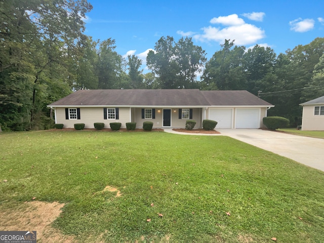 single story home featuring a front lawn and a garage