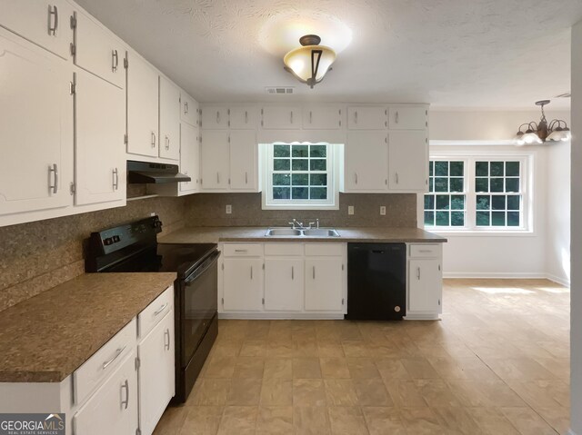 kitchen featuring black appliances, backsplash, sink, and white cabinets