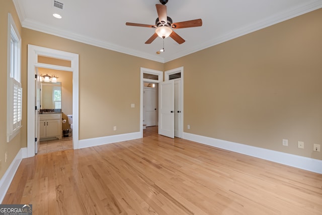 unfurnished bedroom with ceiling fan, ornamental molding, light hardwood / wood-style floors, and ensuite bathroom