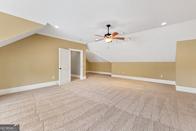 bonus room featuring carpet, ceiling fan, and vaulted ceiling