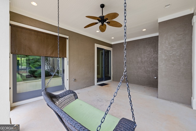 view of patio featuring ceiling fan