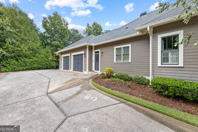 exterior space with a garage