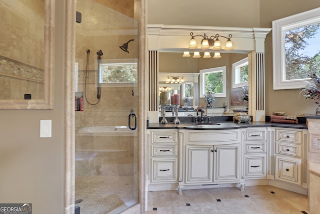 bathroom featuring vanity and walk in shower