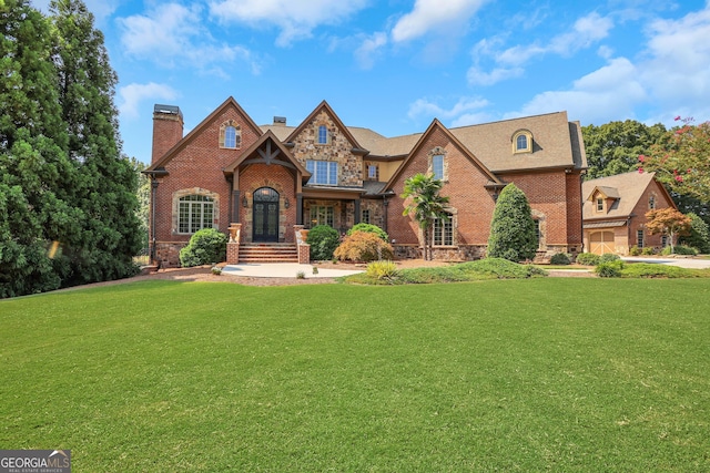 view of front of home with a front yard