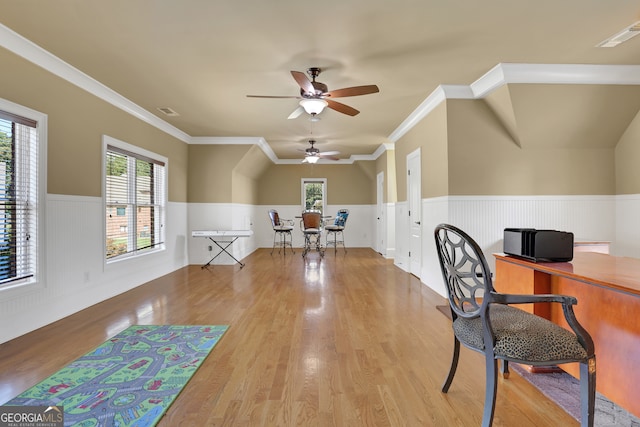 office area with ornamental molding, light hardwood / wood-style flooring, and ceiling fan