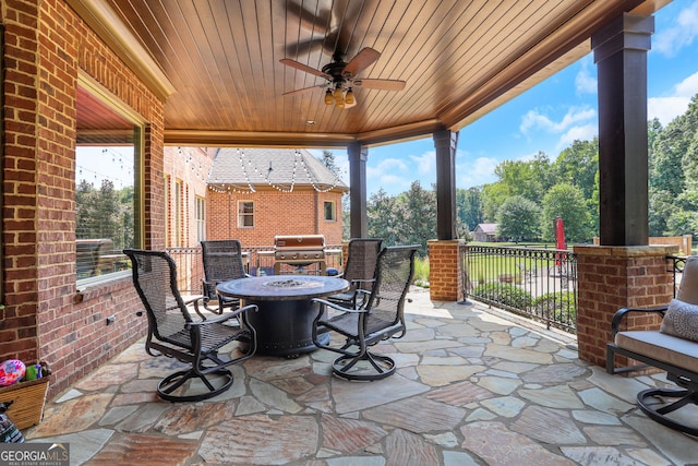 view of patio featuring grilling area and ceiling fan