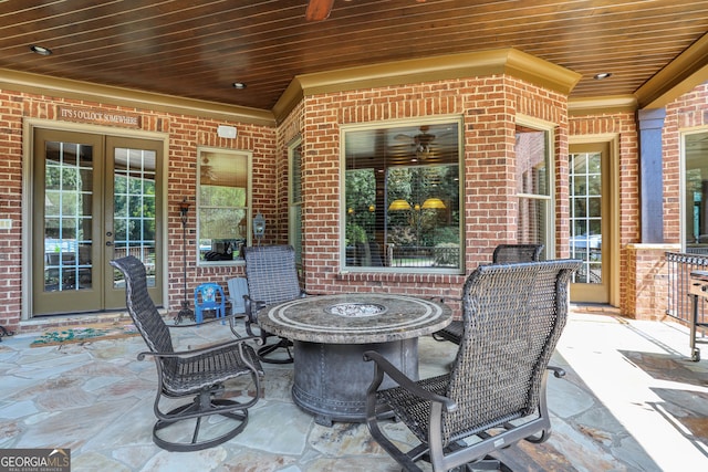 view of patio / terrace with an outdoor fire pit