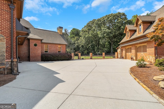 view of side of property with a garage