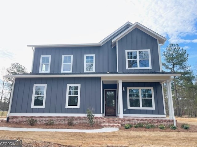 view of front of property with covered porch and board and batten siding