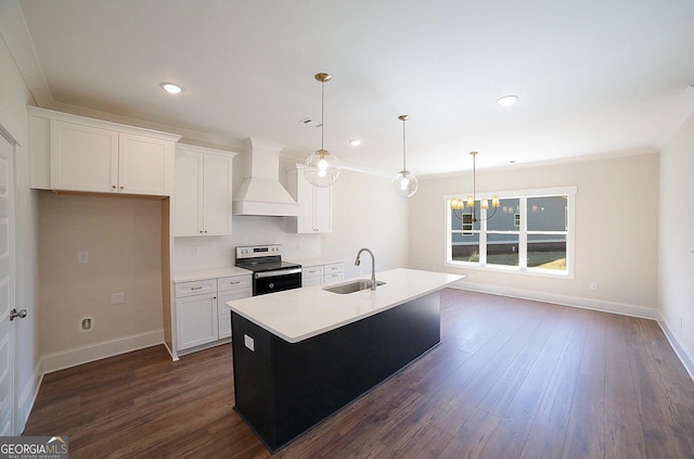 kitchen with stainless steel electric range oven, a sink, premium range hood, white cabinetry, and dark wood-type flooring