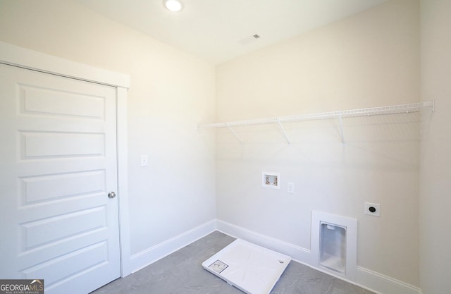 laundry room featuring laundry area, baseboards, hookup for a washing machine, and electric dryer hookup