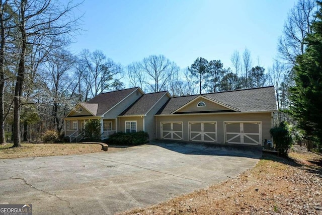 single story home with a garage