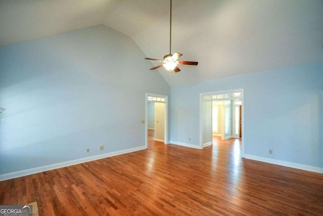 unfurnished room with high vaulted ceiling, wood-type flooring, and ceiling fan