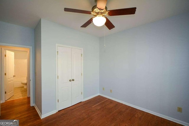 unfurnished bedroom featuring a closet, ceiling fan, and hardwood / wood-style flooring