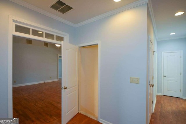 6865 Cowan Mill Rd, Winston, GA 30187 - hall with baseboards, ornamental molding, recessed lighting, visible vents, and wood finished floors