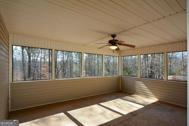 6865 Cowan Mill Rd, Winston, GA 30187 - unfurnished sunroom with a ceiling fan