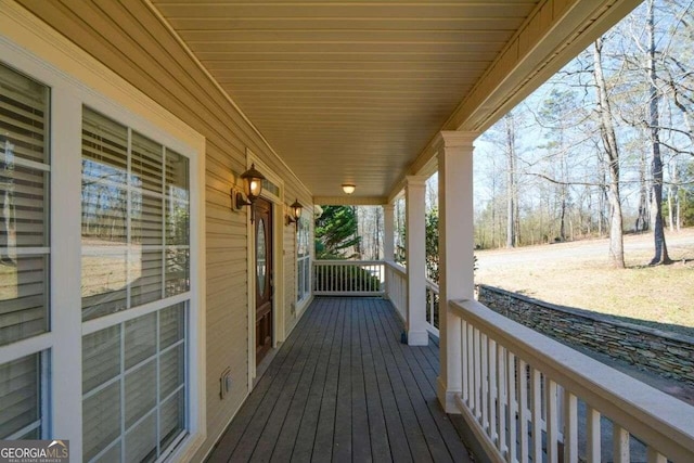 deck featuring covered porch