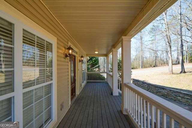 6865 Cowan Mill Rd, Winston, GA 30187 - wooden terrace featuring covered porch