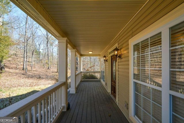 wooden deck featuring a porch