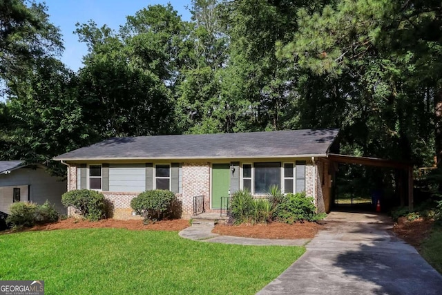 ranch-style house with a carport and a front yard