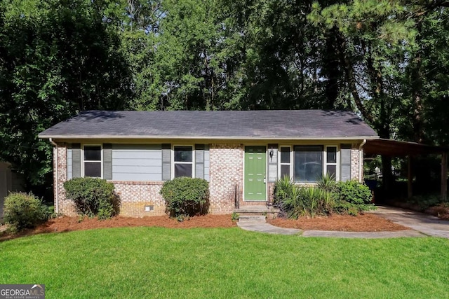 ranch-style home with a front yard and a carport