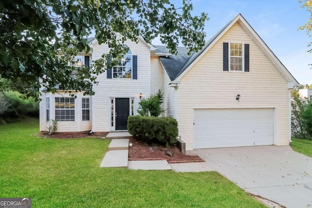 front facade featuring a garage and a front lawn