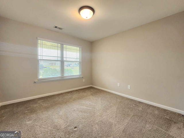 view of carpeted spare room