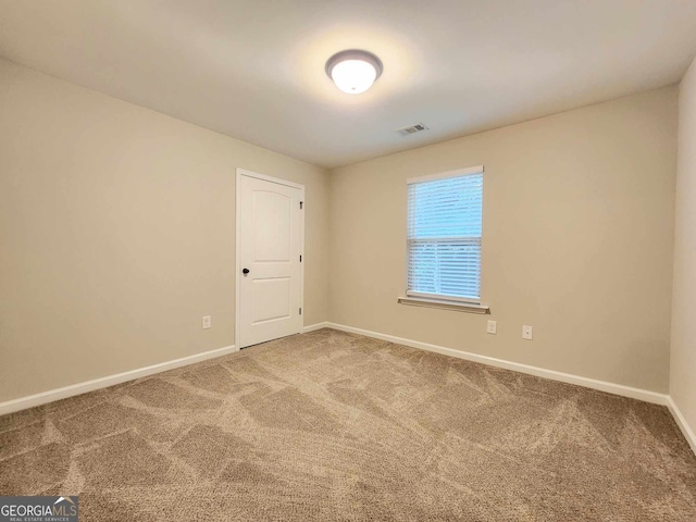 unfurnished room with carpet