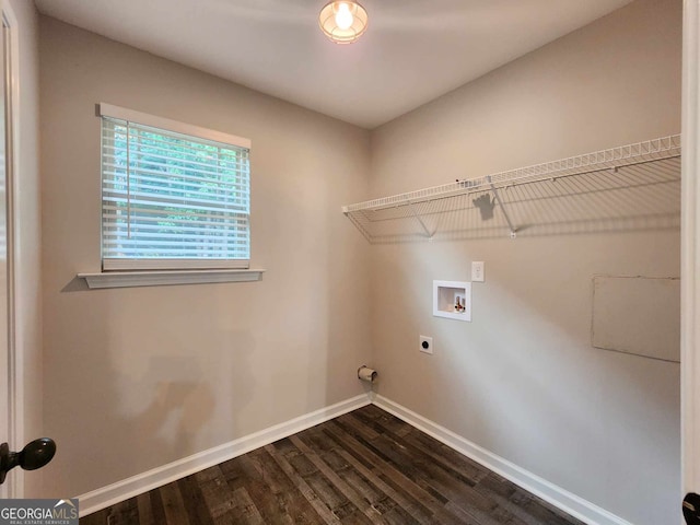 washroom featuring dark wood-type flooring, washer hookup, and hookup for an electric dryer