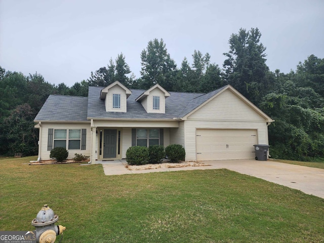 view of front facade featuring a front lawn and a garage