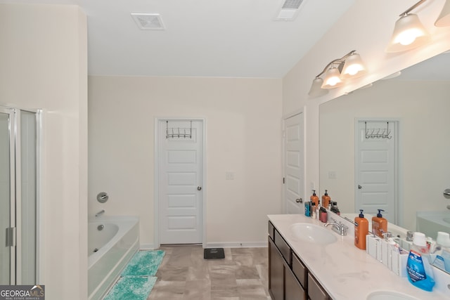 bathroom featuring vanity and separate shower and tub