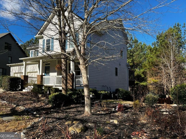 view of property with covered porch