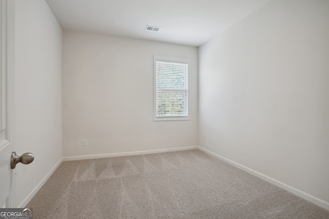 empty room with carpet floors