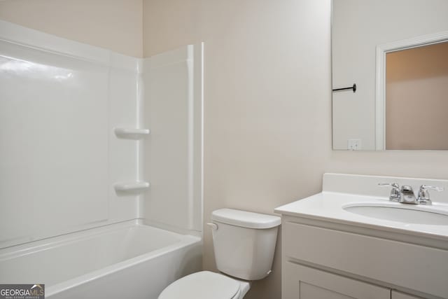 full bathroom with vanity, toilet, and shower / washtub combination