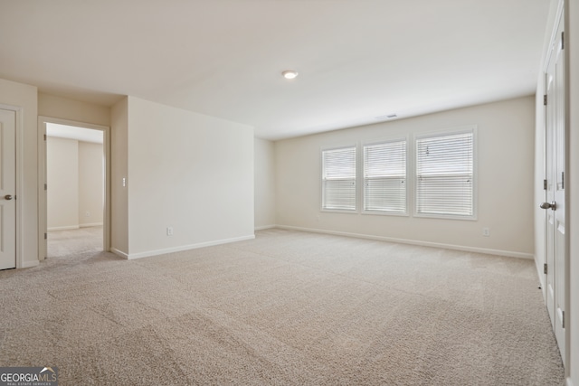 view of carpeted spare room