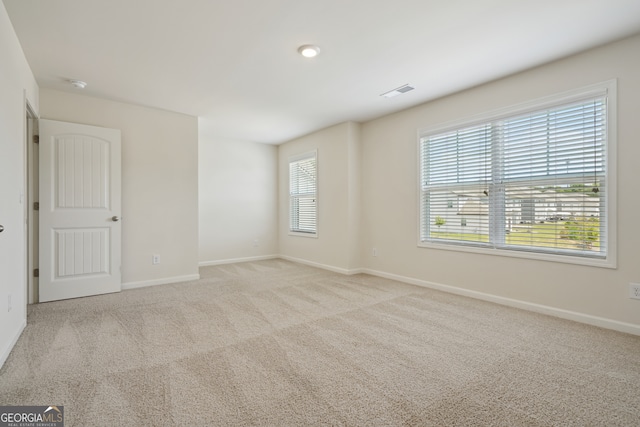 view of carpeted spare room