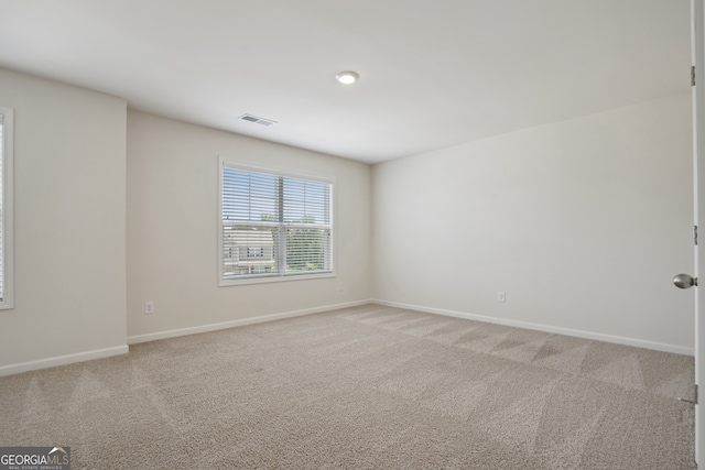 view of carpeted spare room