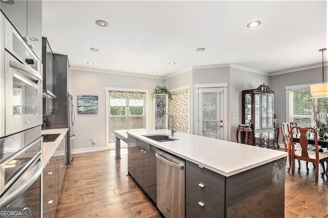 103 Royal Way, Mcdonough, GA 30252 - kitchen with light wood-type flooring, modern cabinets, a sink, stainless steel appliances, and light countertops