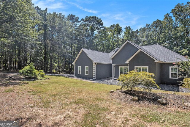 exterior space featuring a front lawn