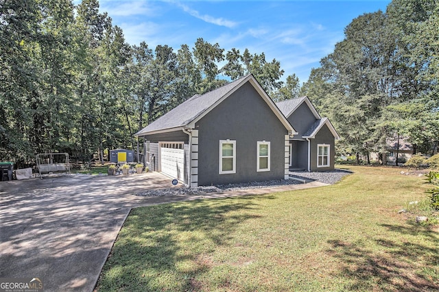 103 Royal Way, Mcdonough, GA 30252 - view of front facade with concrete driveway, a garage, a front yard, and stucco siding