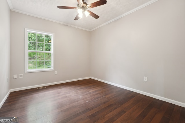 unfurnished room featuring crown molding, a textured ceiling, ceiling fan, and dark hardwood / wood-style floors